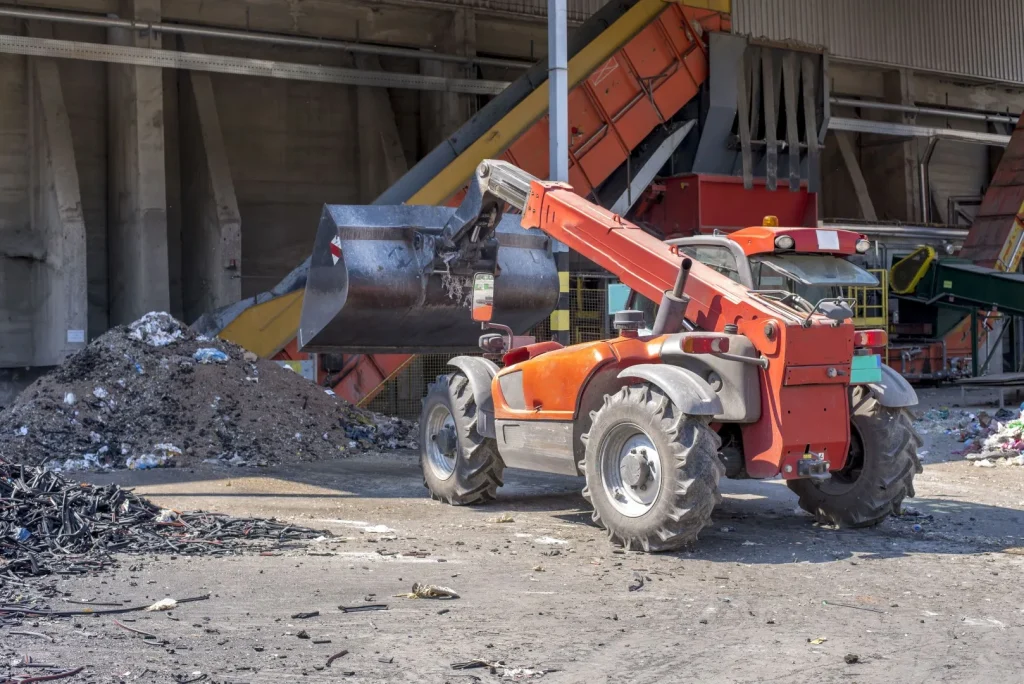 loader-transporting-soil-waste-materials-waste-treatment-plant